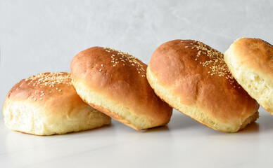 fresh baked buns with sesame and poppy  seeds