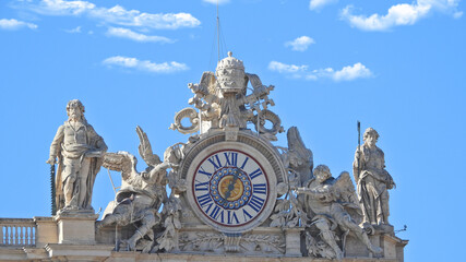 Fototapeta na wymiar Zoom detail photo of main clock in Saint Peter Basilica, Vatican City, Rome, Italy