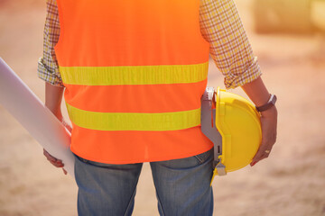 Female surveyors and road builders plan jobs for road construction in Shire.