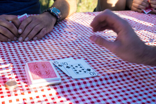 Hand reaching for card