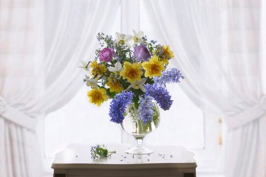 Still life with splendid bouquet of spring flowers