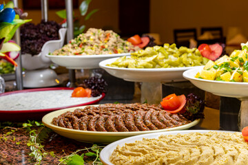 Open buffet full of delicious fruits with orange, grape, watermelon