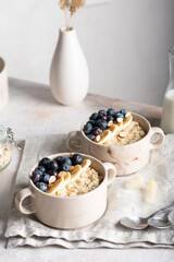 Morning breakfast with oatmeal porridge and blueberries