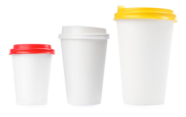 Set with different paper coffee cups on white background