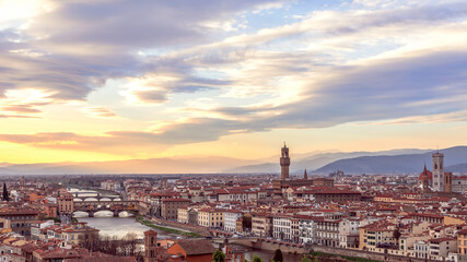 Fototapeta na wymiar Panoramic view of the historic center of Florence and Palazzo Vecchio, Florence Cathedral, Ponte Vecchio during sunset. Tuscany, Italy