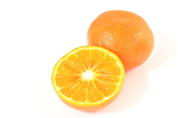 orange half cutting with water drop on white background