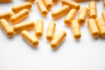 Omega-3 Fish Fat Oil Capsules. Fish oil capsules isolated on white background. Close up of capsules Omega 3 on white background. Health care concept. Nutritional supplements. Vitamins