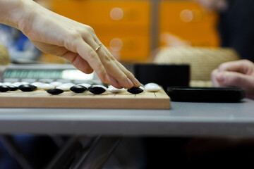 playing the game of go, process game