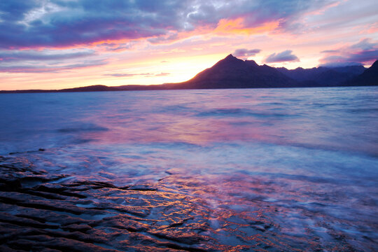 The Cuillin Ridge on the Isle of Skye, Scotland, UK, from Elgol, at sunset.