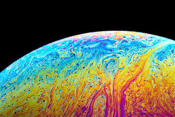 Macro shot of a soap bubble simulating a planet