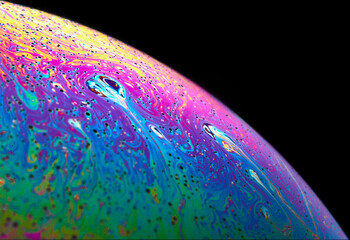 Macro shot of a soap bubble simulating a planet