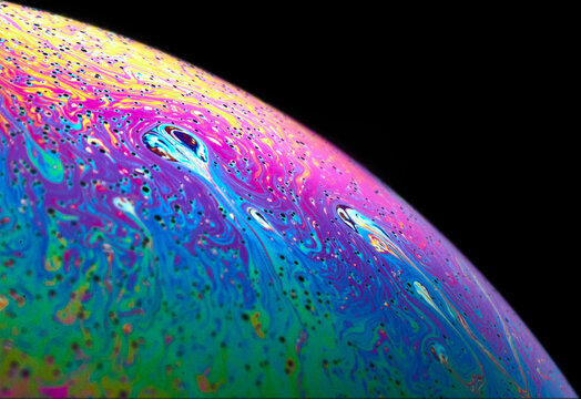 Macro shot of a soap bubble simulating a planet