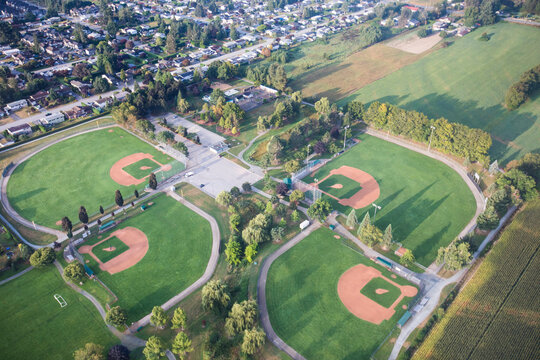 Aerial view of baseball fields and parkland.