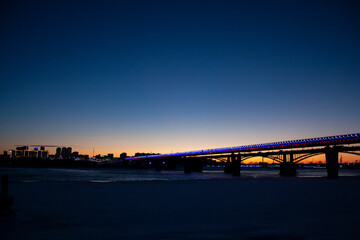 Evening city of Novosibirsk at sunset. Blue hour time