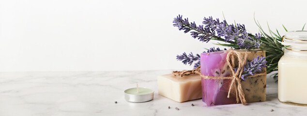 Banner with lavender cosmetics products and place for text. Home body skin care, Spa setting © colnihko