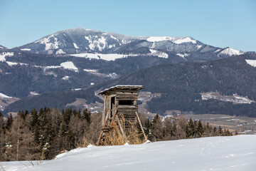 wooden deer stand in area named steirisches almenland in austria