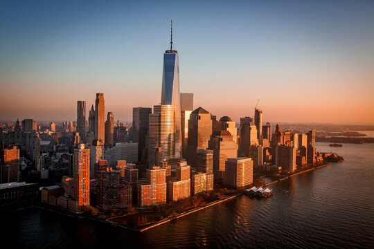 Sunset over Freedom Tower and New York City's Financial District.