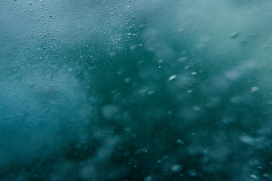 Playful bubbles below the waves