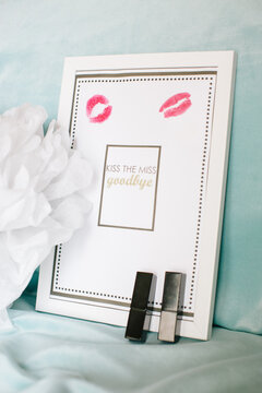 Goodbye note in the frame. Lipstick trail and lipstick.