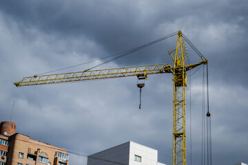 Free-standing tower crane on the construction site.