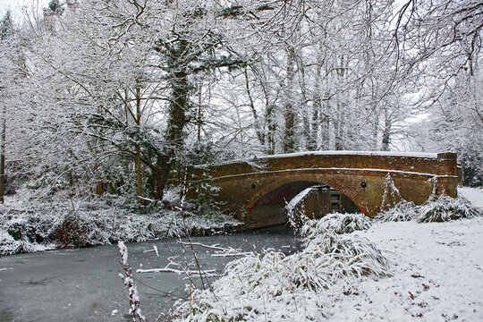 bridge over the frozen Basingstoke canal in south England