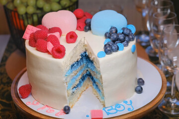Prediction of the birth of a boy or girl by the filling of the cake. Pink and blue baby gender...