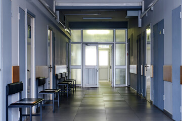 An empty hospital corridor without people, doctors, or patients. Ending the problems with the coronavirus epidemic, concept