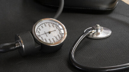 Closeup of Blood Pressure Measuring. measuring  blood pressure using a mechanical tonometer  at home