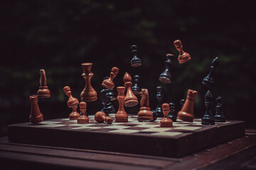 falling chess pieces on the chessboard