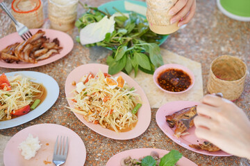 Thai street food. Thai spicy salad or Thai papaya salad. Locally called 