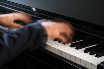 prodigy person playing piano  fast