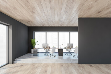 Mockup copy space in wooden black office room with minimalist furniture and computers