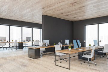 Wooden black office room with minimalist furniture and computers