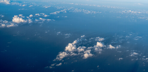 Naklejka na ściany i meble Clouds over the Atlantic Ocean