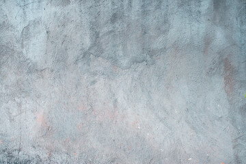 Concrete wall for interiors or outdoor exposed surface. Untreated concrete wall with plaster, repairs in the apartment