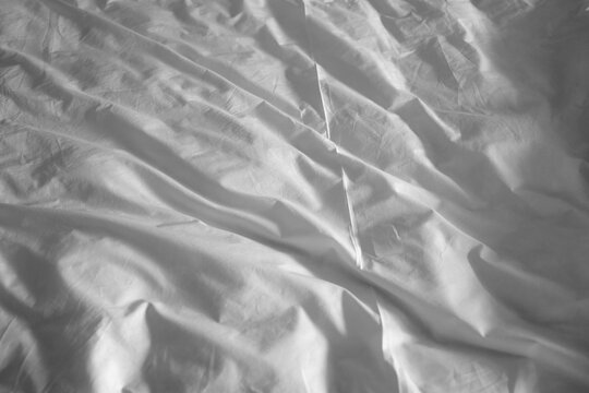 Full frame photo of the rumpled bed sheet