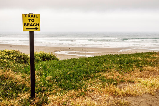 Trail sign near beach in Sonoma Coast State Park, northern California