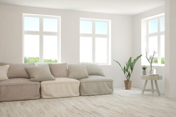 White living room with sofa and summer landscape in window. Scandinavian interior design. 3D illustration