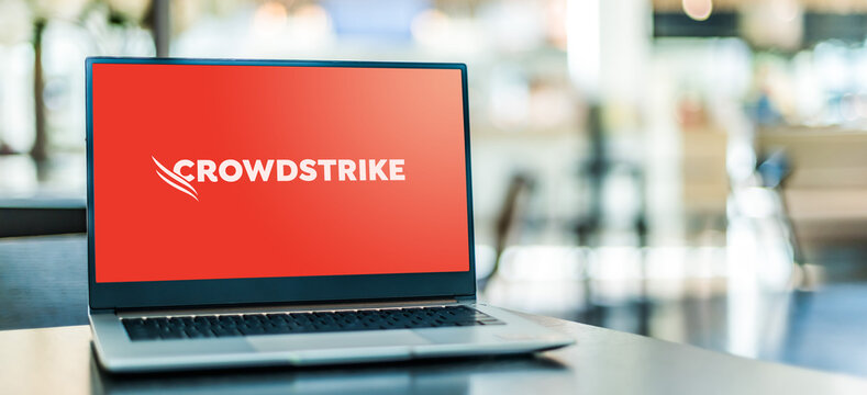 Laptop computer displaying logo of CrowdStrike