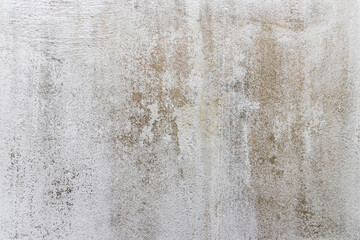 White painted cement wall with stain texture and background.