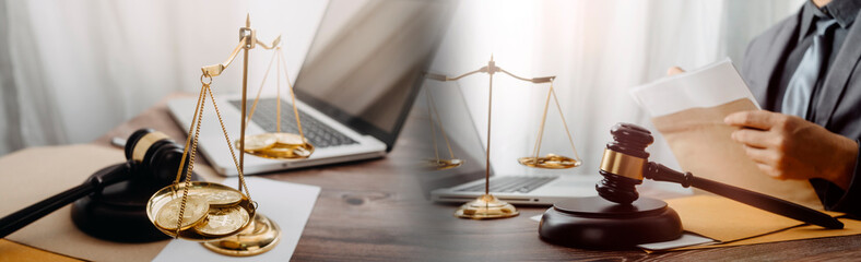 Justice and law concept.Male judge in a courtroom with the gavel, working with, computer and...