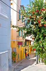 The colorful bougainvillea flowers in old town of Nafplio, Greece