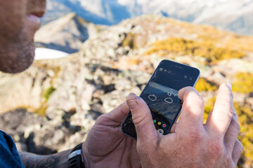 Climber sending map and instructions to Search and rescue team