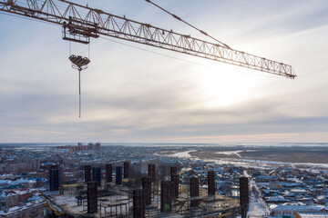 monolithic house at the stage of construction of a monolithic fill, photographed from a flying drone at sunset