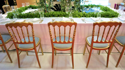 Wedding decoration. Wedding celebration. Banquet table designed in Art Nouveau style for a wedding party