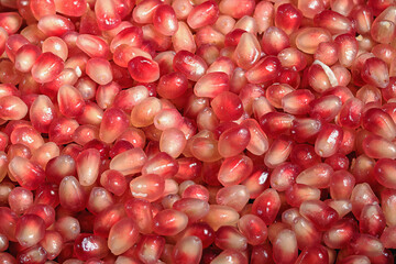 Fresh pomegranate seeds close-up for food background