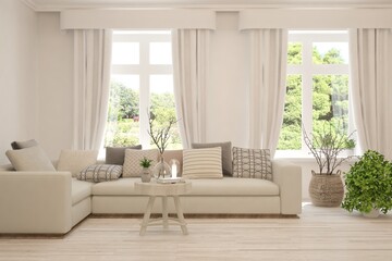 White living room with sofa and summer landscape in window. Scandinavian interior design. 3D illustration