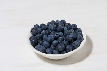 fresh farm blueberries on white background