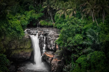 Fotobehang Tegenungan Waterfall in Bali Indonesia famous travel destination long exposure © KAPhotography