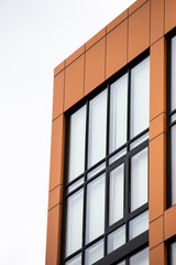 Orange Building on White Background with Windows